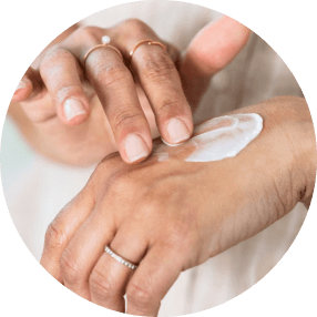 Applying ArthroMD+ Cream on hand